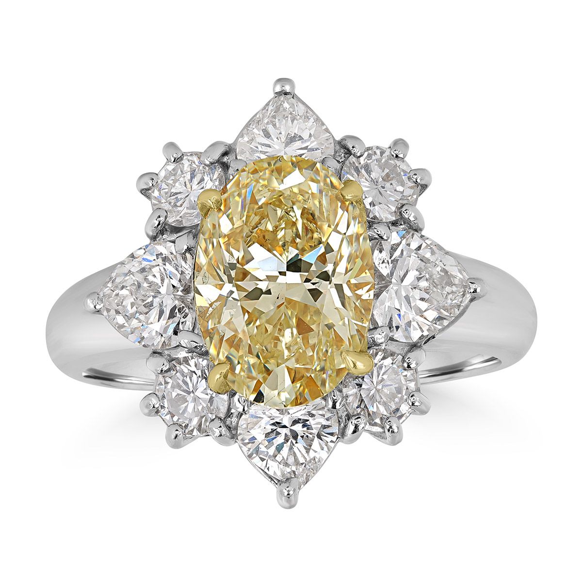 A fancy yellow diamond retouched without color drift — the yellow stays exactly as graded, while the white diamonds around it stay white.